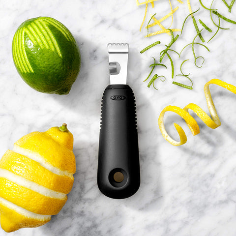 OXO Good Grips citrus zester in cocktail garnishing scene for fresh twists.