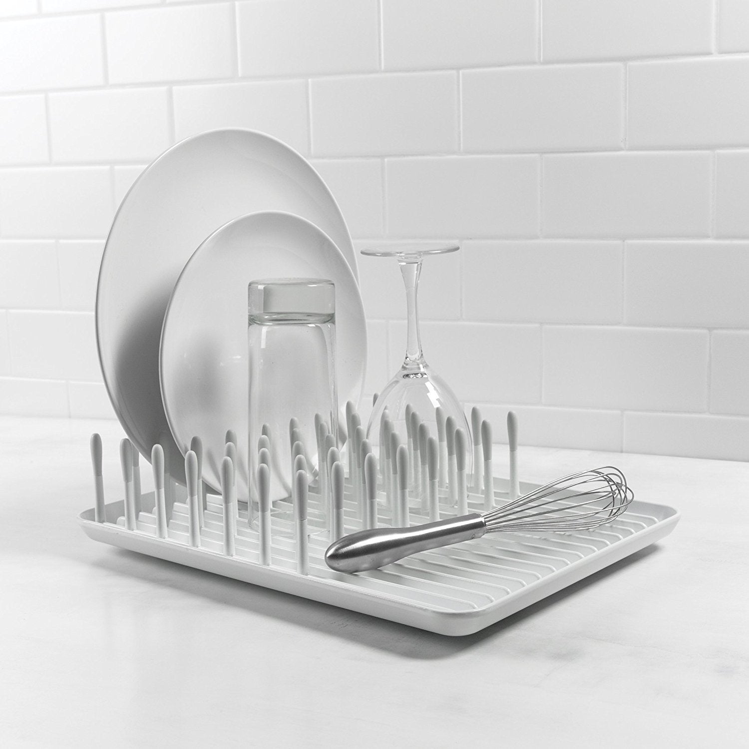 OXO Good Grips compact dish rack biscuit offers front space for drying small parts.