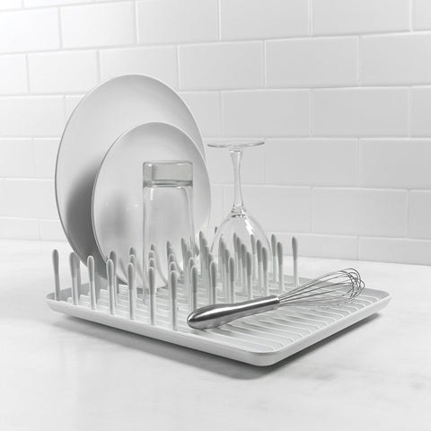 OXO Good Grips compact dish rack biscuit offers front space for drying small parts.