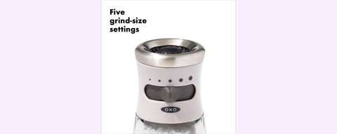 OXO Good Grips salt grinder close-up highlights corrosion-resistant ceramic grinder.