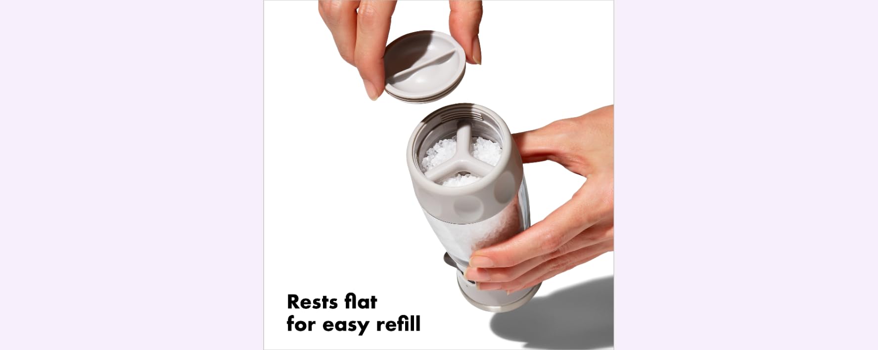 OXO Good Grips salt grinder enables quick refills by turning over and unscrewing cap.