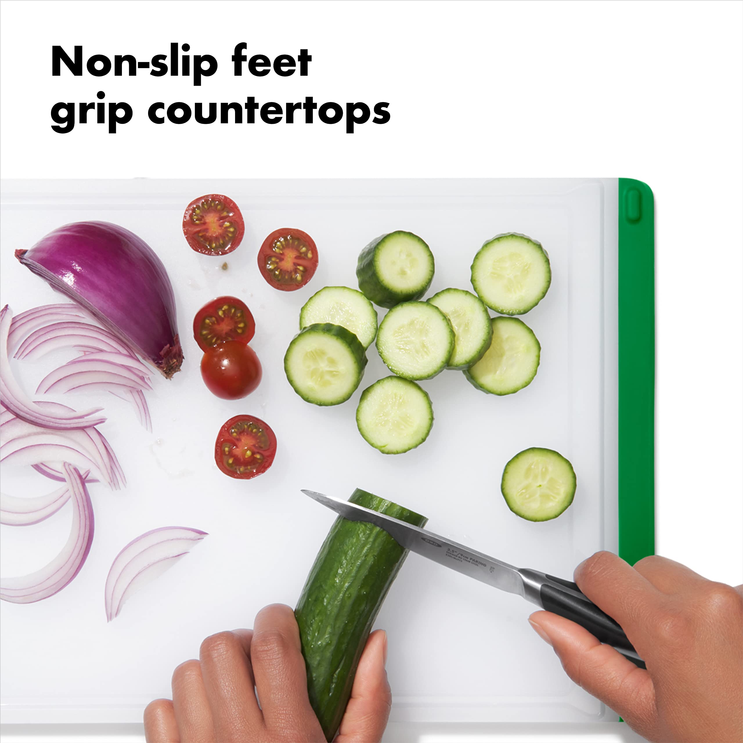 OXO Good Grips cutting board with integrated drip-catcher minimizes juices and mess.