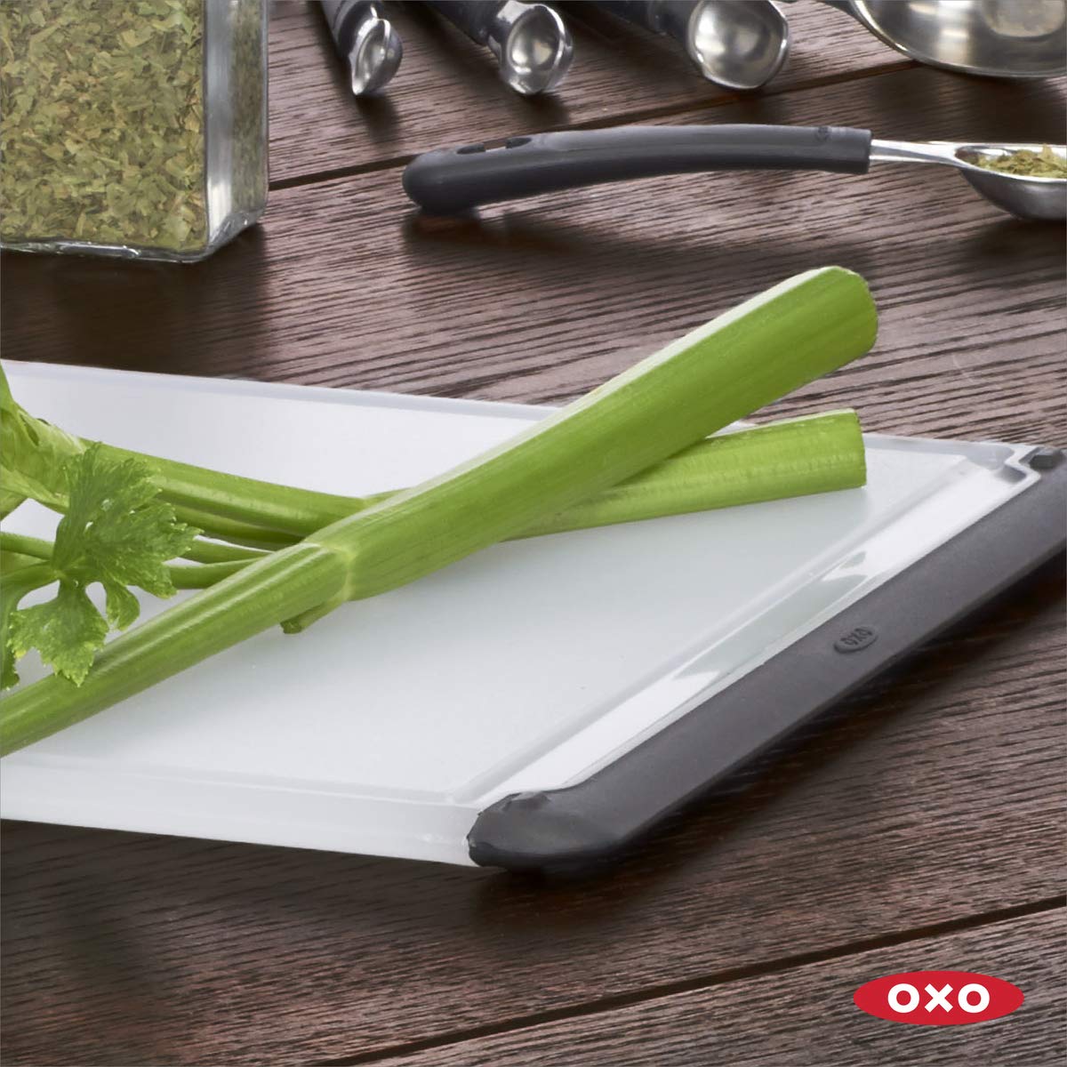 OXO Good Grips cutting board offers a large work area for family meals