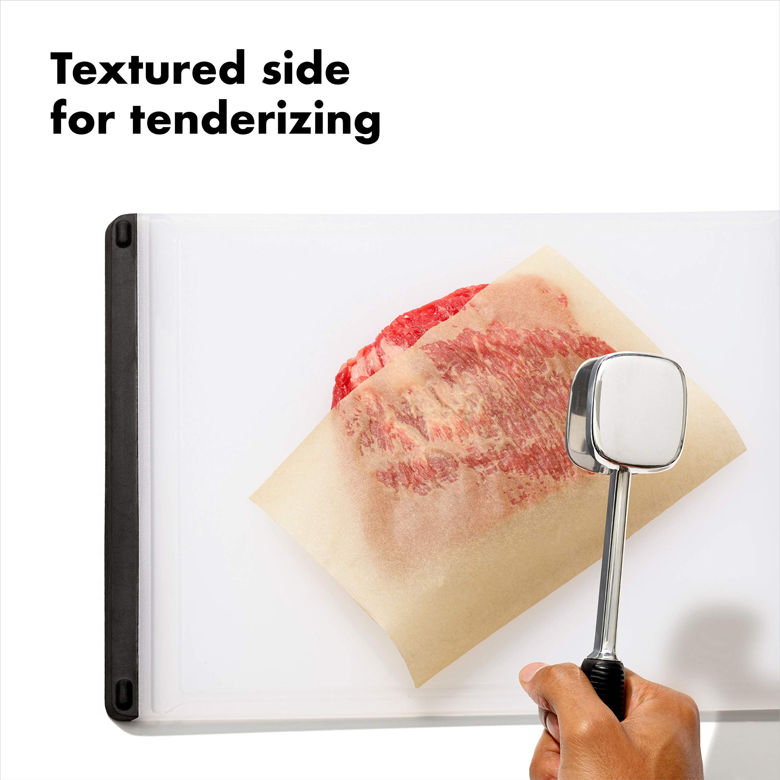 OXO Good Grips die-cast tenderizer smooth side for even flattening.