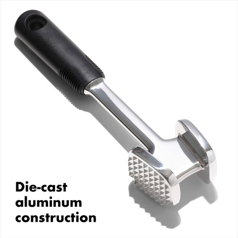 OXO Good Grips die-cast tenderizer teeth side emphasizes pyramid teeth for tenderizing.