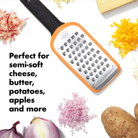 OXO Good Grips shown with potatoes on a cutting board.