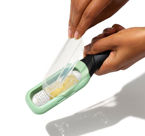OXO Good Grips garlic paste grated evenly on the surface.