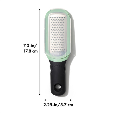 OXO Good Grips grater handle provides a comfortable grip during ginger grating.