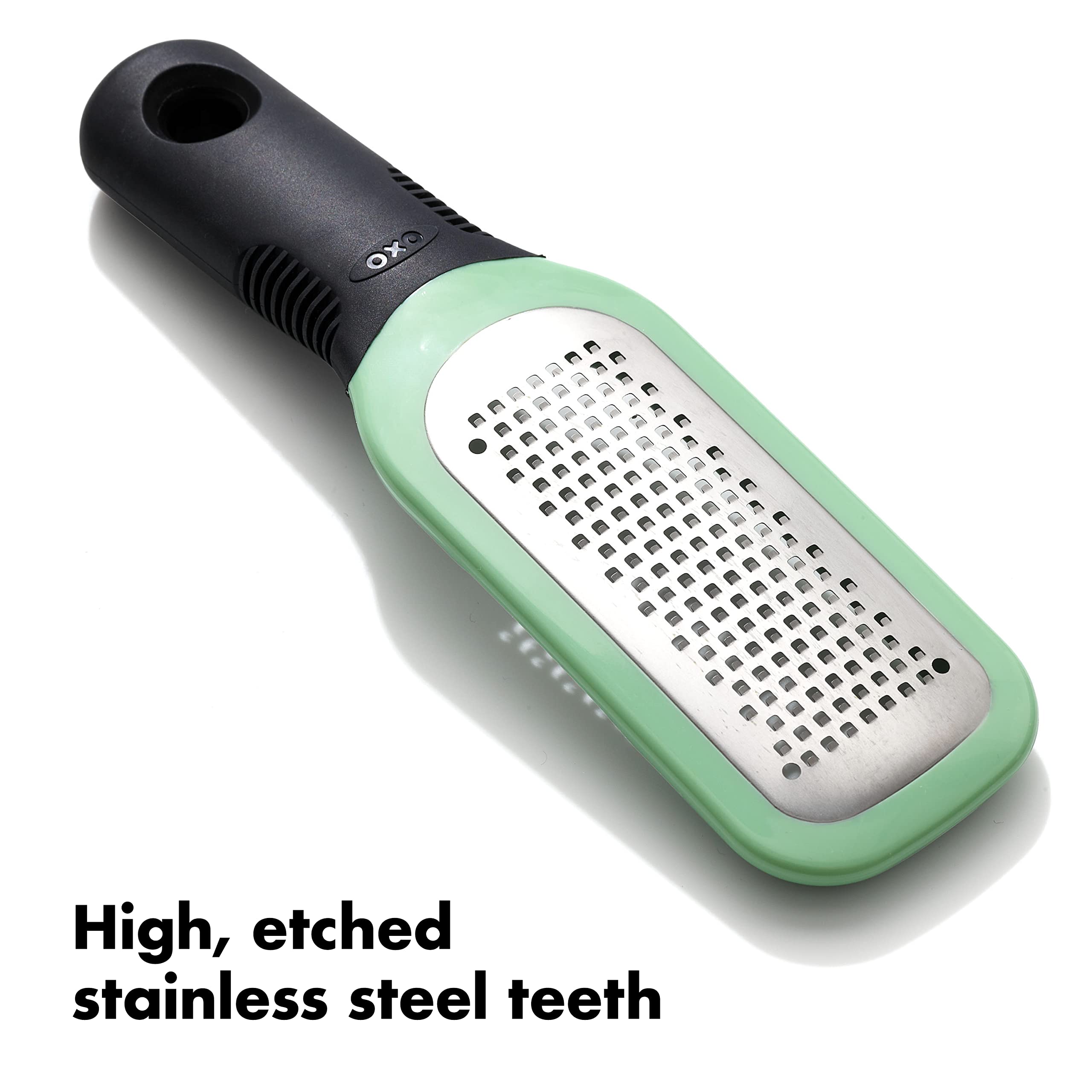 OXO Good Grips etched grater with snap-on cover keeps hands clean.