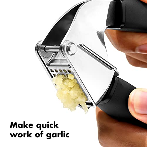 OXO Good Grips Garlic Press swing basket makes emptying easy