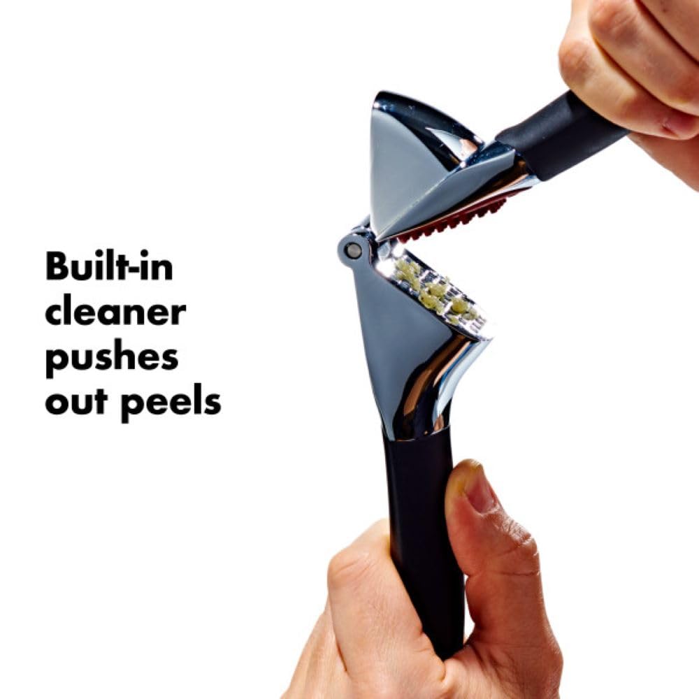 OXO Good Grips garlic press soft non-slip handles reducing hand strain during squeezing