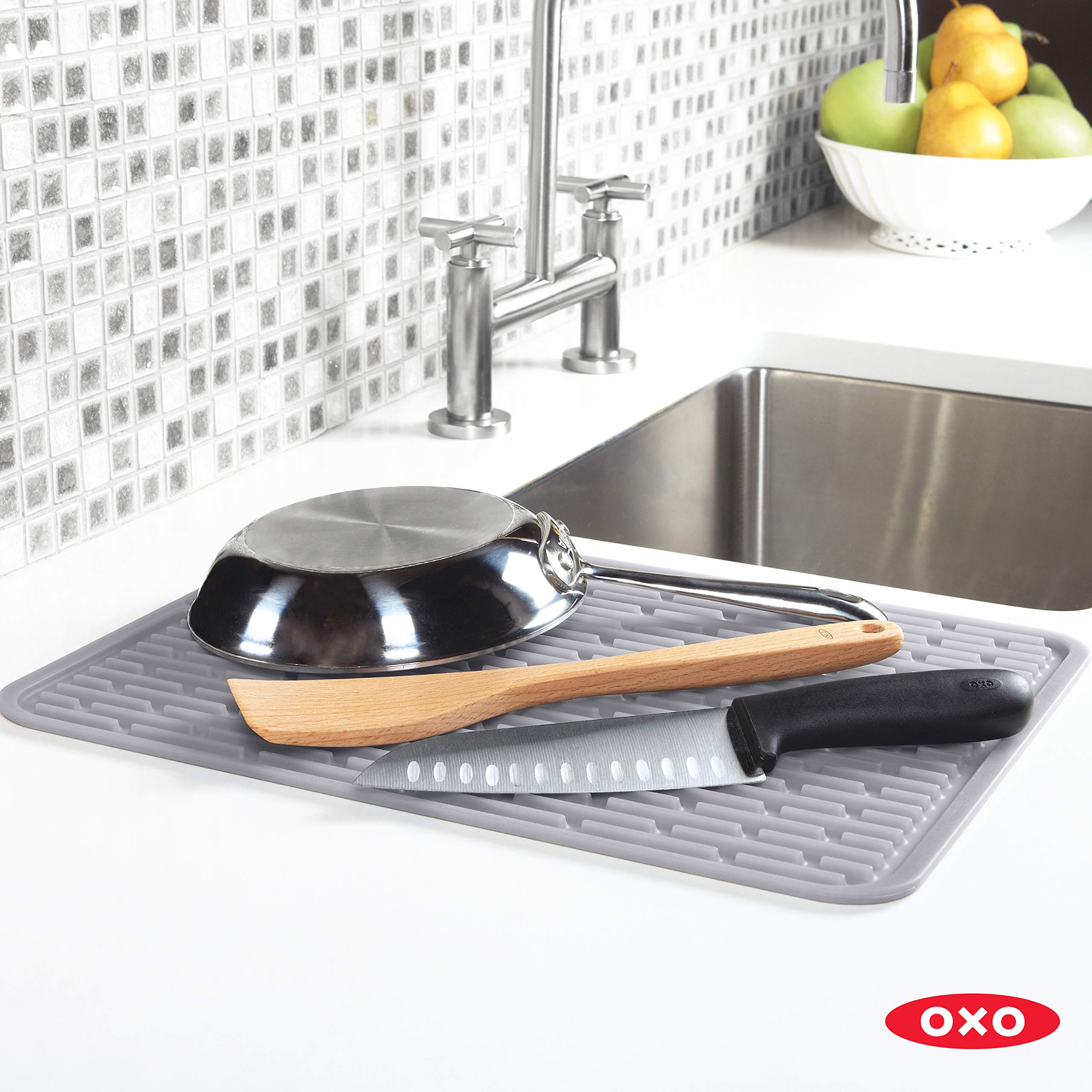 OXO Good Grips drying mat ribbed design enhances drainage and aeration.