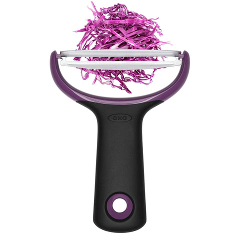 OXO Good Grips peeler peeling butternut squash strips without effort.