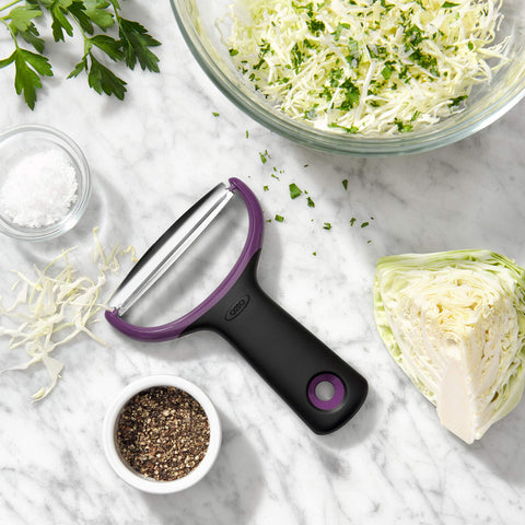 OXO Y-Prep Peeler with dishwasher-safe construction in a sink-side scene.