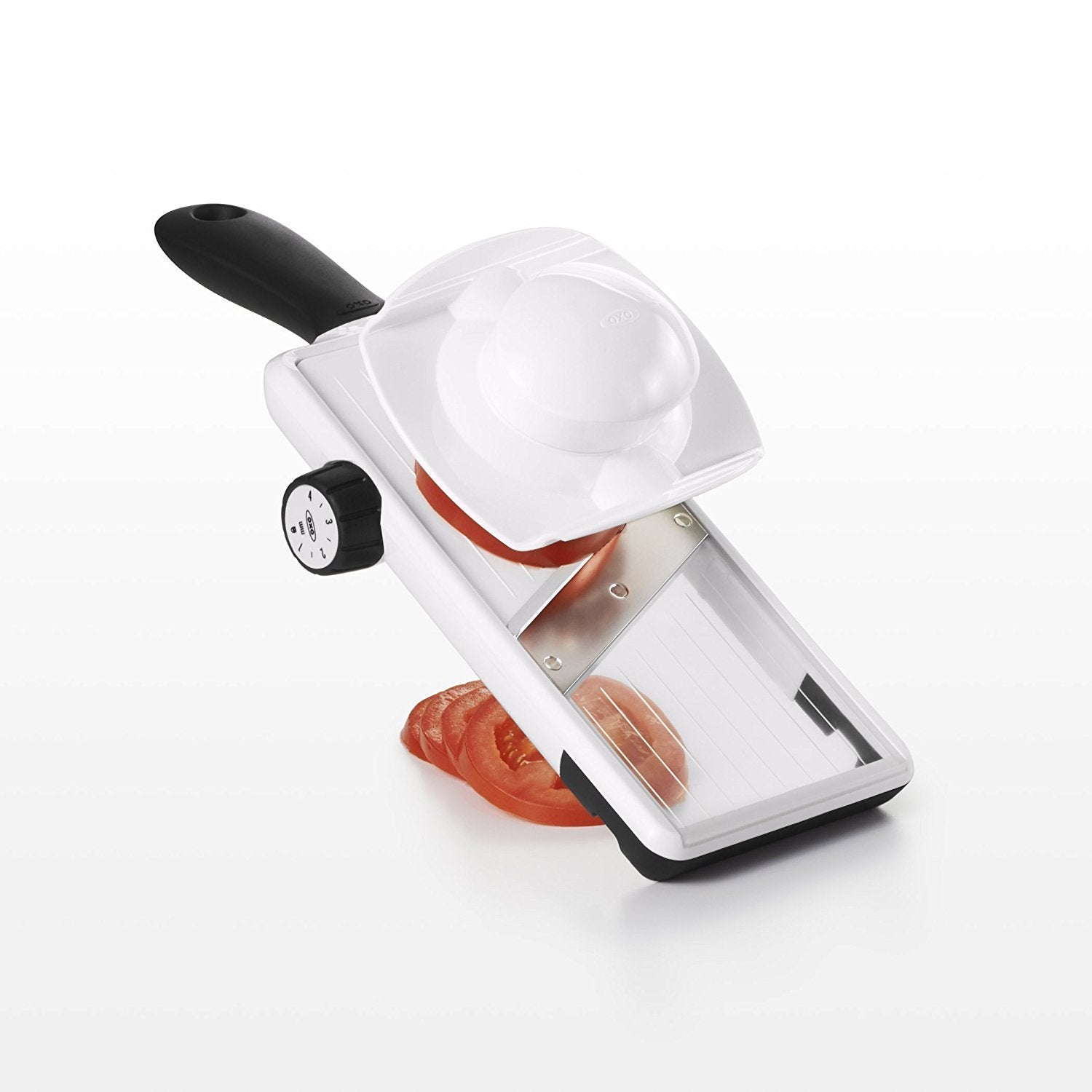 OXO Good Grips Large Mandoline blade lock and storage clip keep the tool compact.
