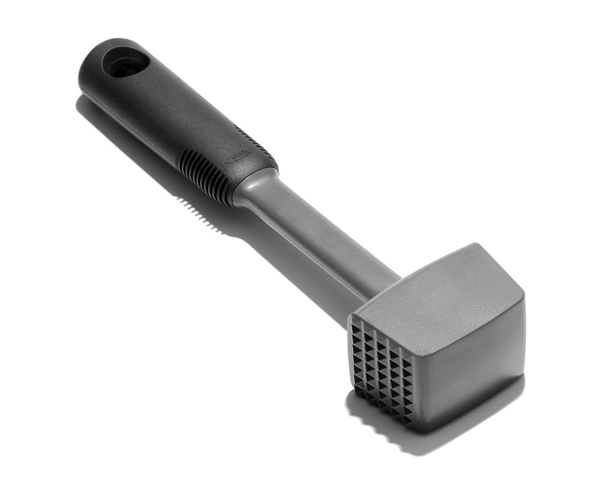 OXO Good Grips Meat Tenderizer with pyramid teeth for effective tenderizing.
