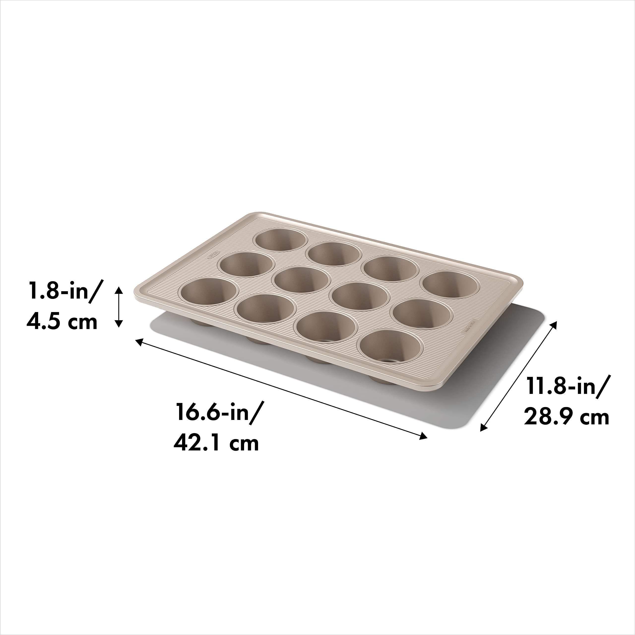 OXO Good Grips muffin pan coating detail highlights ceramic-reinforced, scratch-resistant surface.