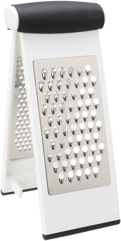 OXO Good Grips Multi Grater on a cutting board for stable upright grating