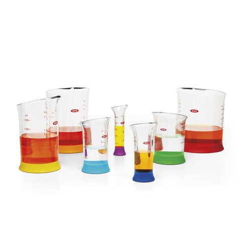OXO Good Grips 2oz beaker designed for precise small-volume measuring.
