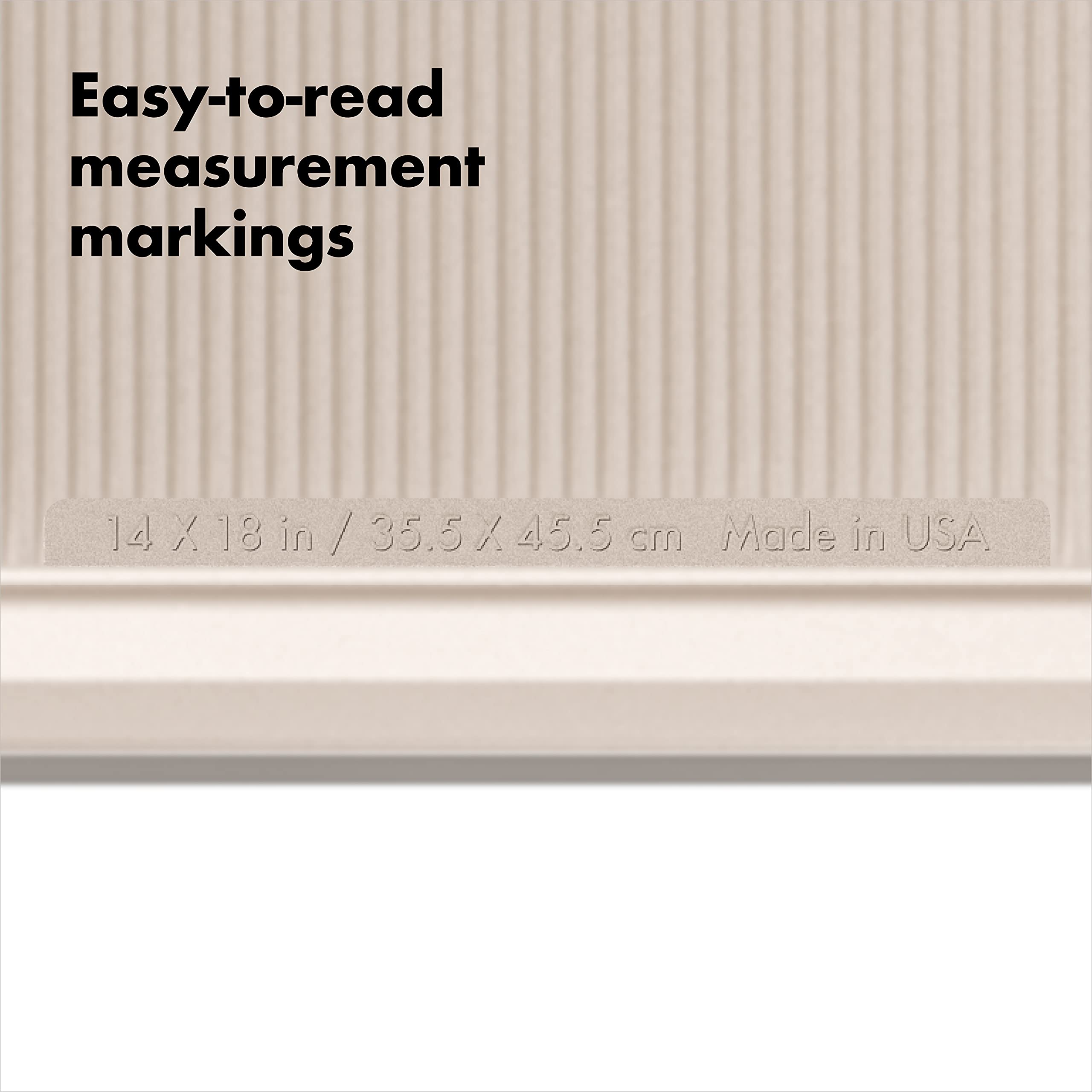 OXO Good Grips non-stick pro sheet provides a secure grip edge for easy handling.