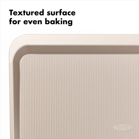 OXO Good Grips pro bakeware cookie sheet features square-rolled edges for durability.