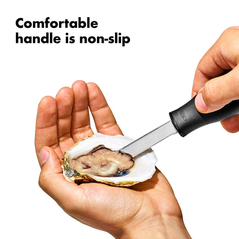 OXO Good Grips Oyster Knife in-use shot shows controlled opening of oysters.