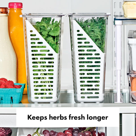 OXO Good Grips Herb Keeper with lid open for quick herb access during meal prep.