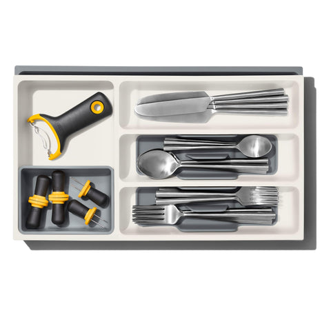 OXO Good Grips removable cup stores wine stoppers and small gadgets.