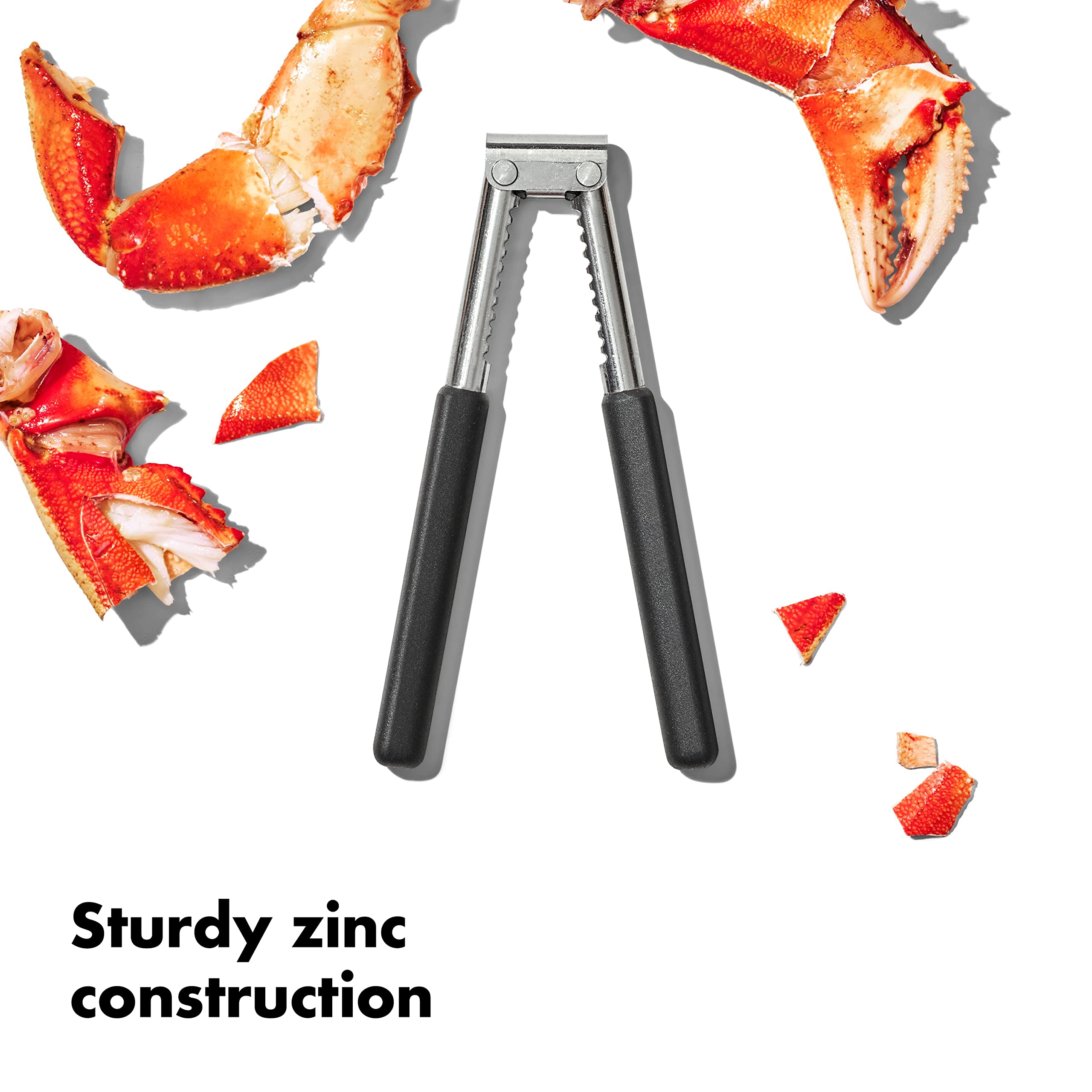 OXO Good Grips seafood & nut cracker in use cracking a lobster claw.
