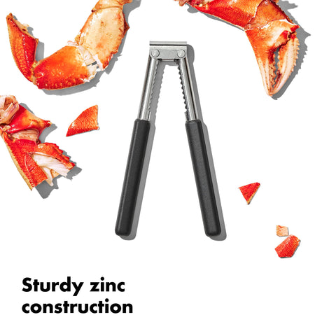 OXO Good Grips seafood & nut cracker in use cracking a lobster claw.