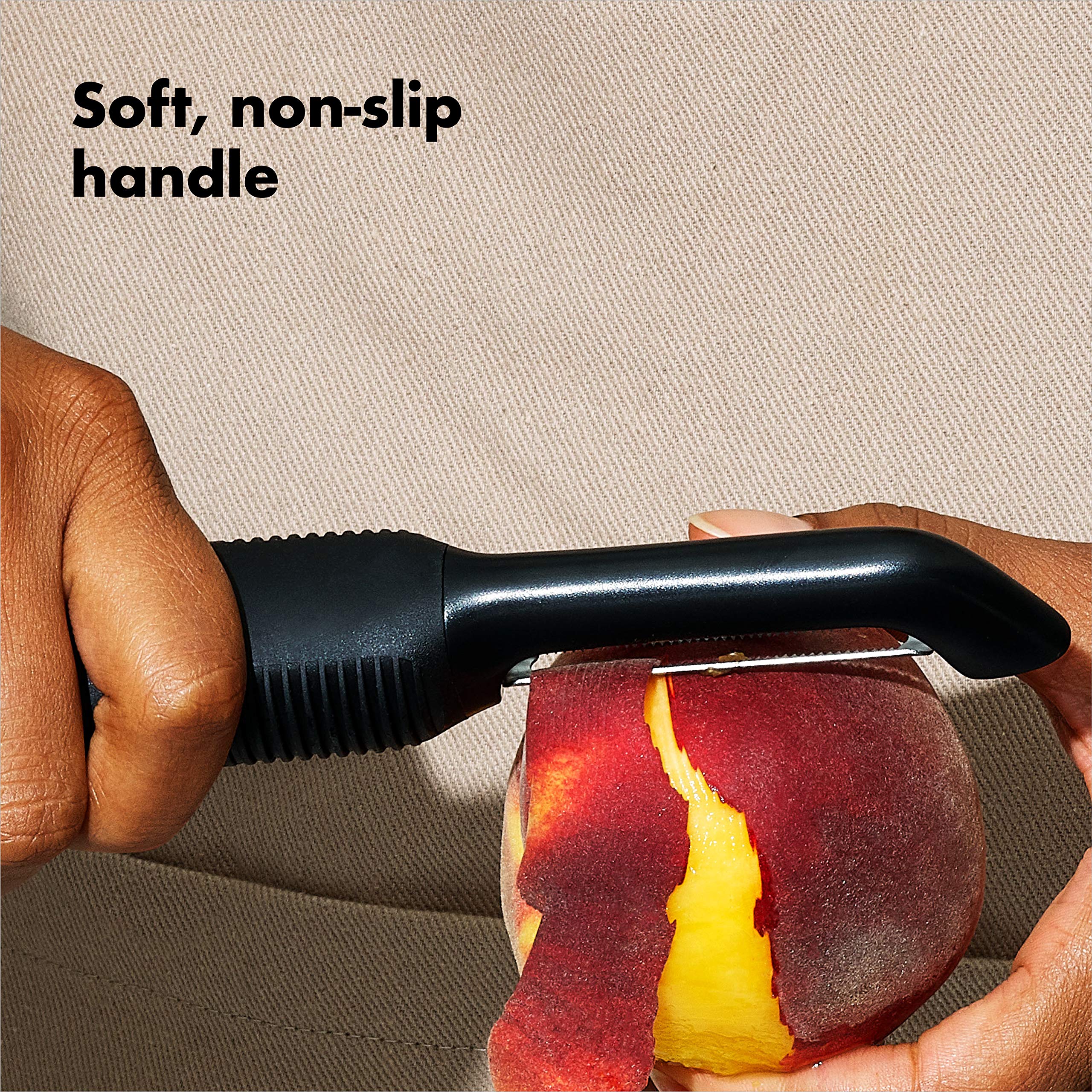 OXO Good Grips Serrated Peeler peeling peach skin without bruising