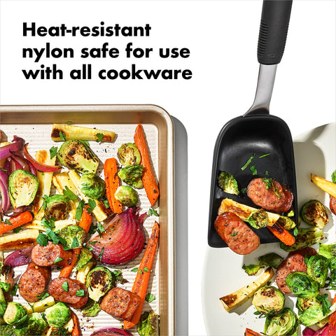 Lifting roasted vegetables and leftovers from pans with the scoop.
