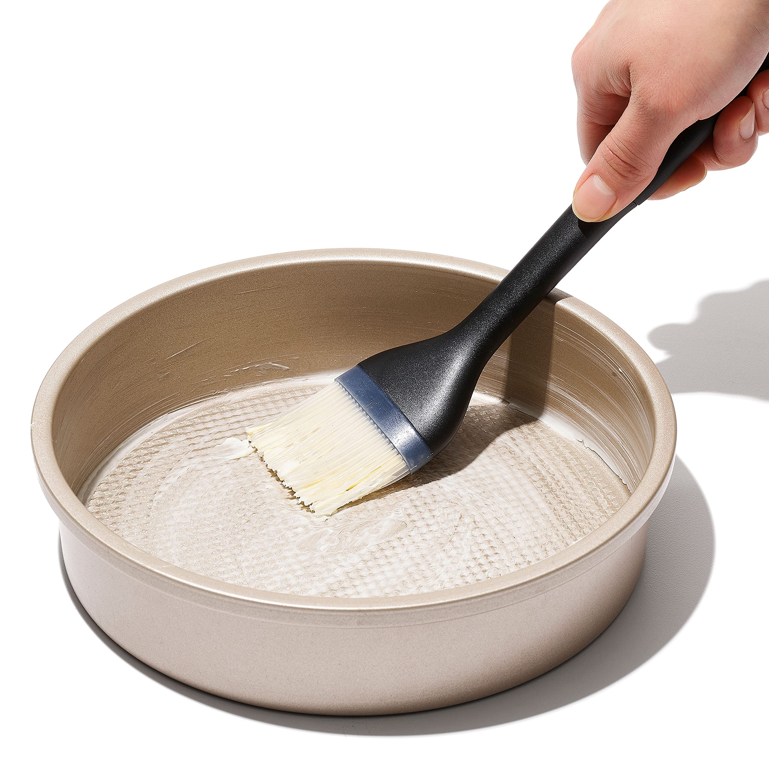 OXO Good Grips silicone basting brush used on roast