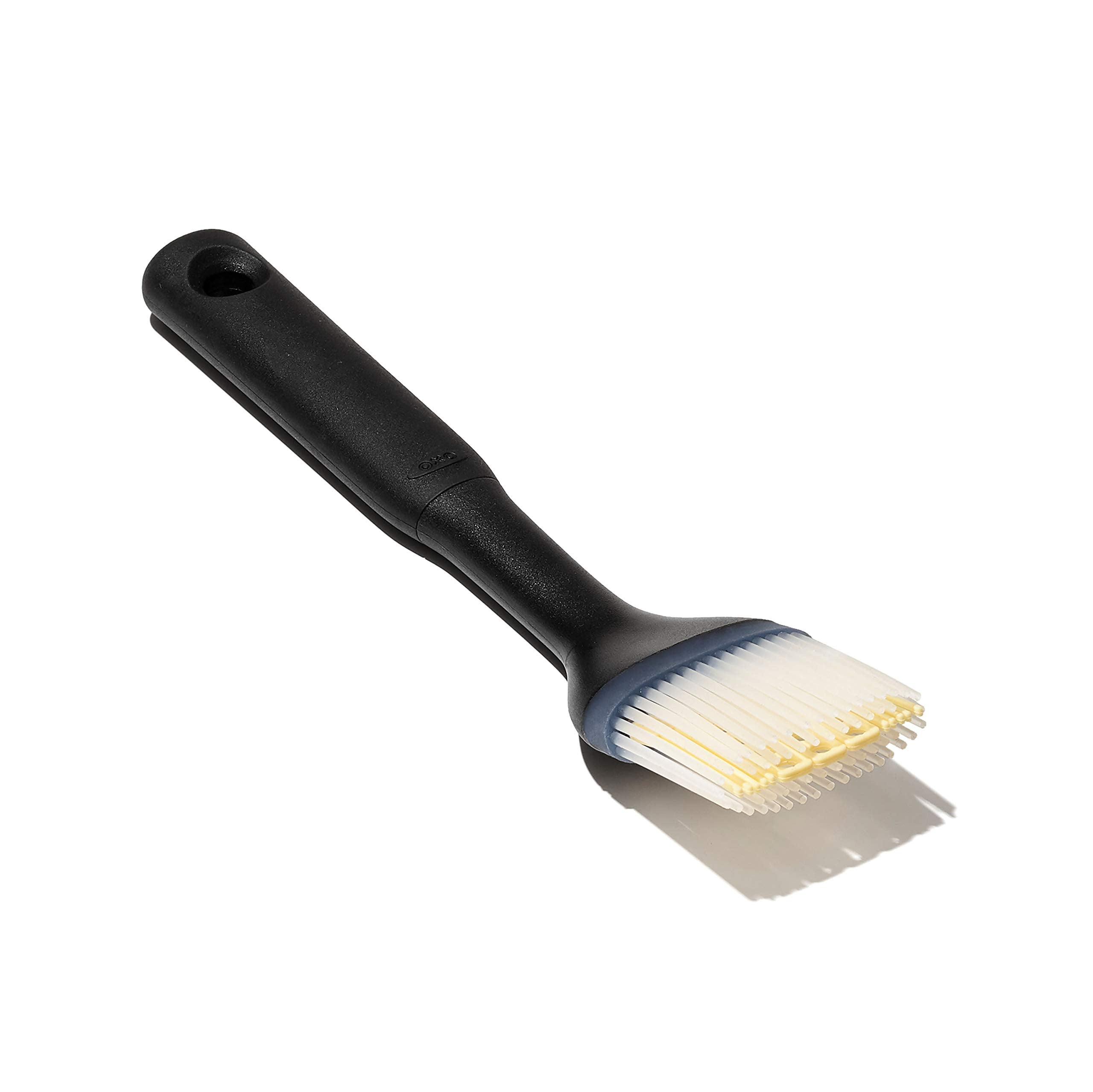 OXO Good Grips silicone basting brush small with angled head for precise glazing.