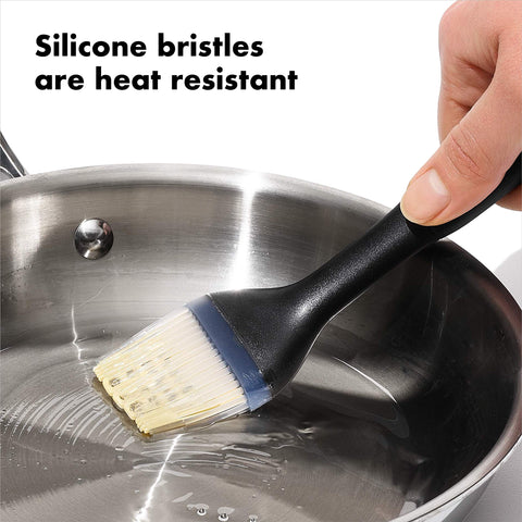 OXO brush with angled head keeps bristles off countertops while glazing.
