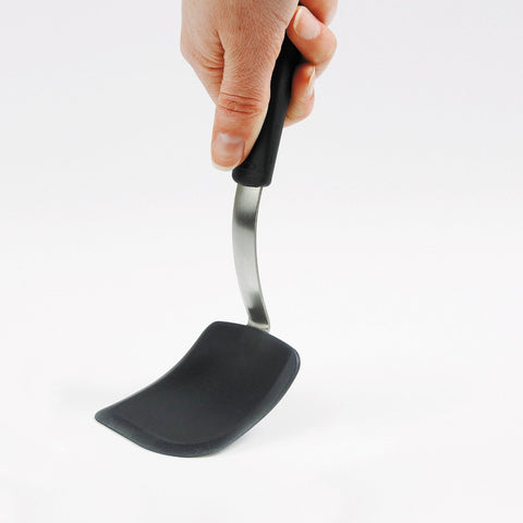 OXO Good Grips spatula with flexible edge slides under foods without breaking cookies