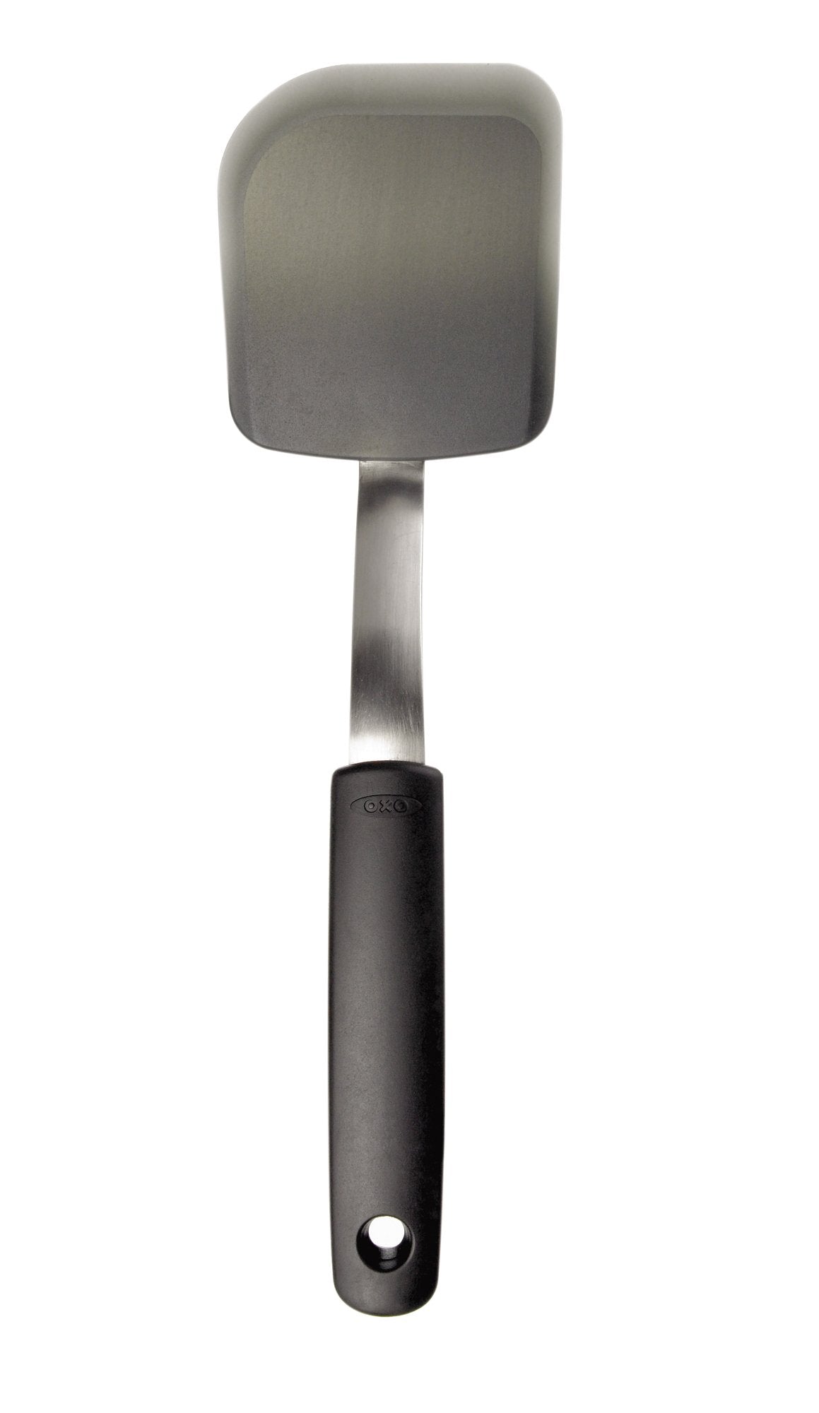 OXO Good Grips silicone cookie spatula on a cookie sheet for easy lifting