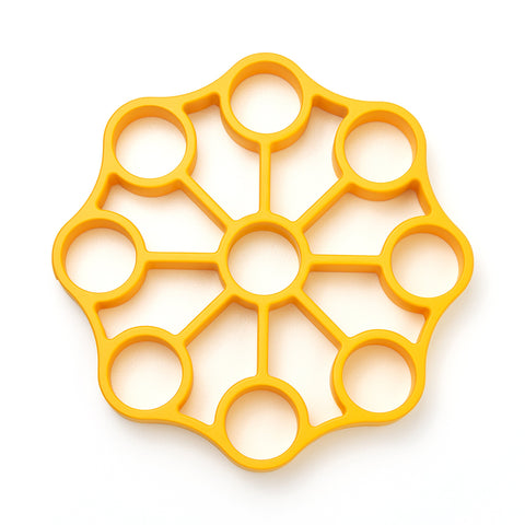 OXO Good Grips silicone egg rack holds nine eggs upright for easy hard boiling