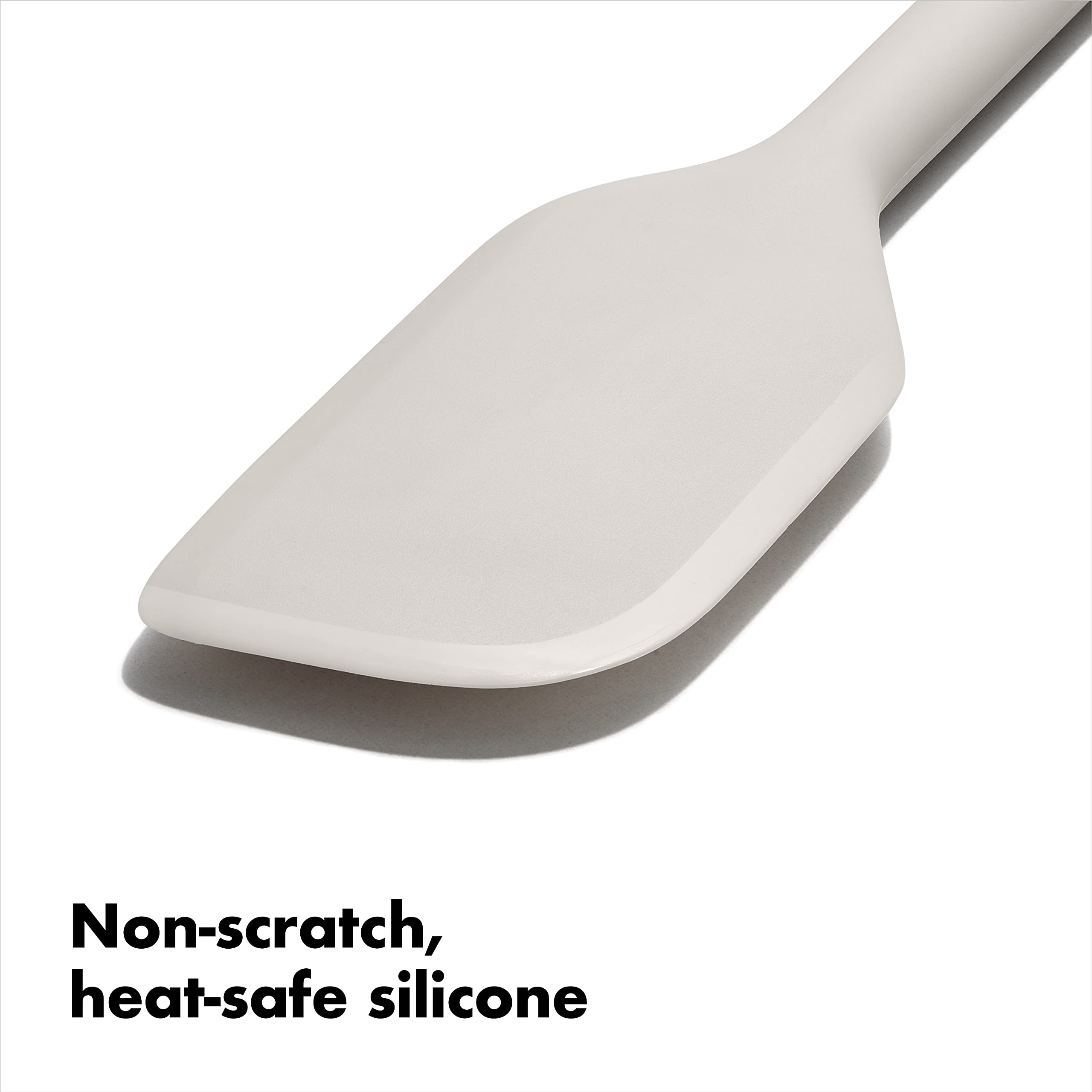 OXO silicone spatula is non-scratch and heat-resistant for cookware.