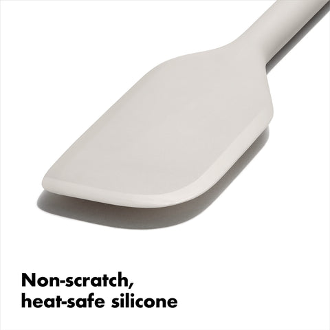 OXO silicone spatula is non-scratch and heat-resistant for cookware.