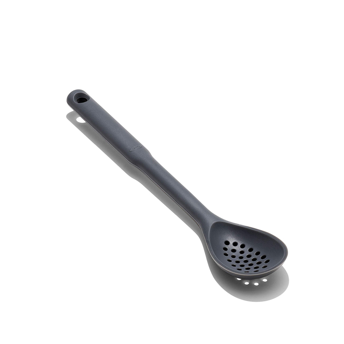 OXO Good Grips silicone slotted spoon Peppercorn, close-up handle with non-slip grip.