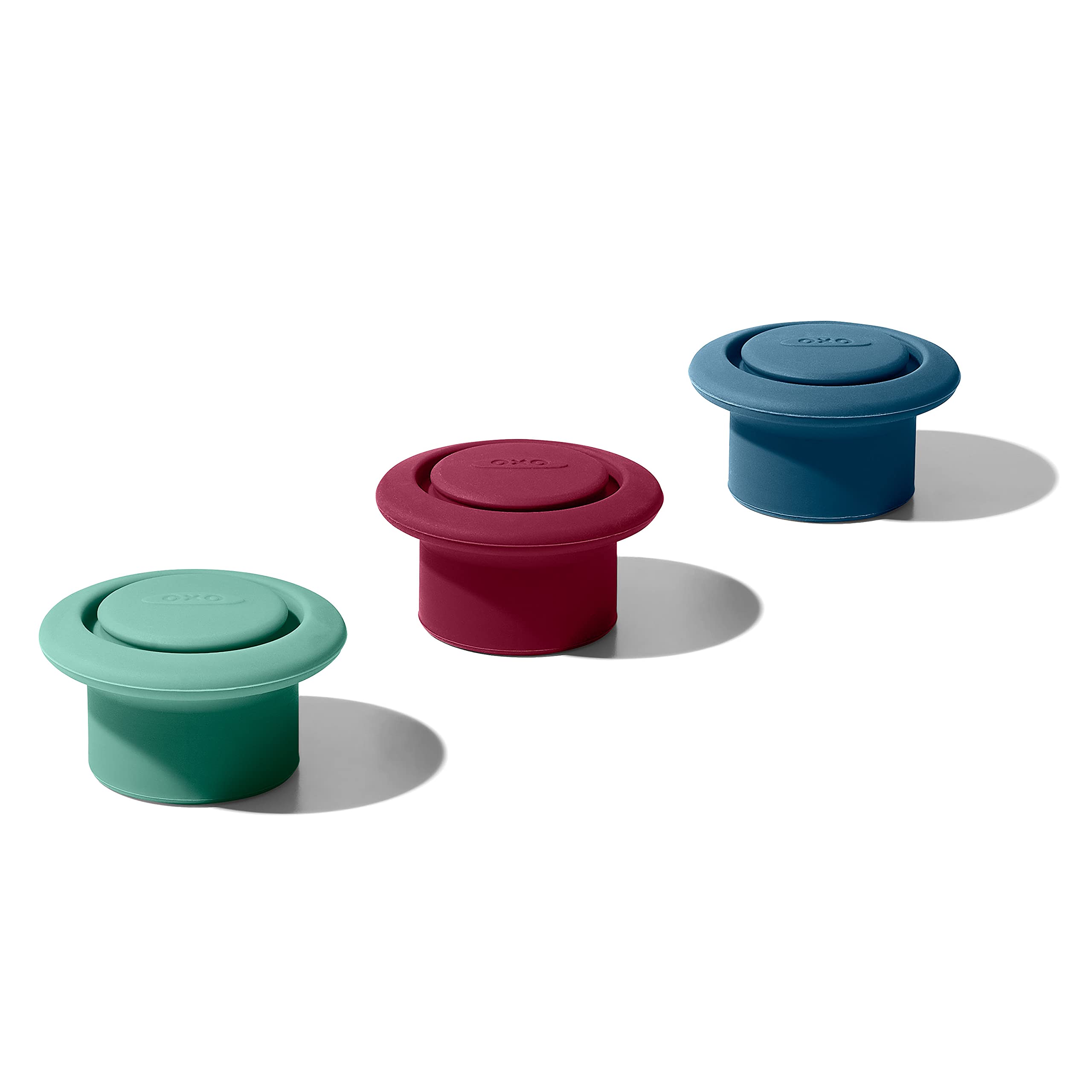 OXO Good Grips silicone wine stoppers cover the bottle opening for an airtight seal.