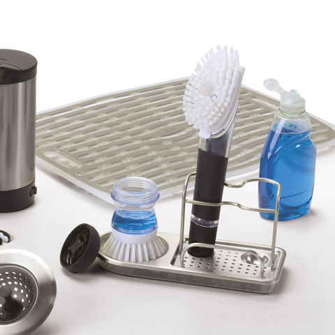 OXO Good Grips sink caddy perforated base promotes quick drying of sponges and tools.