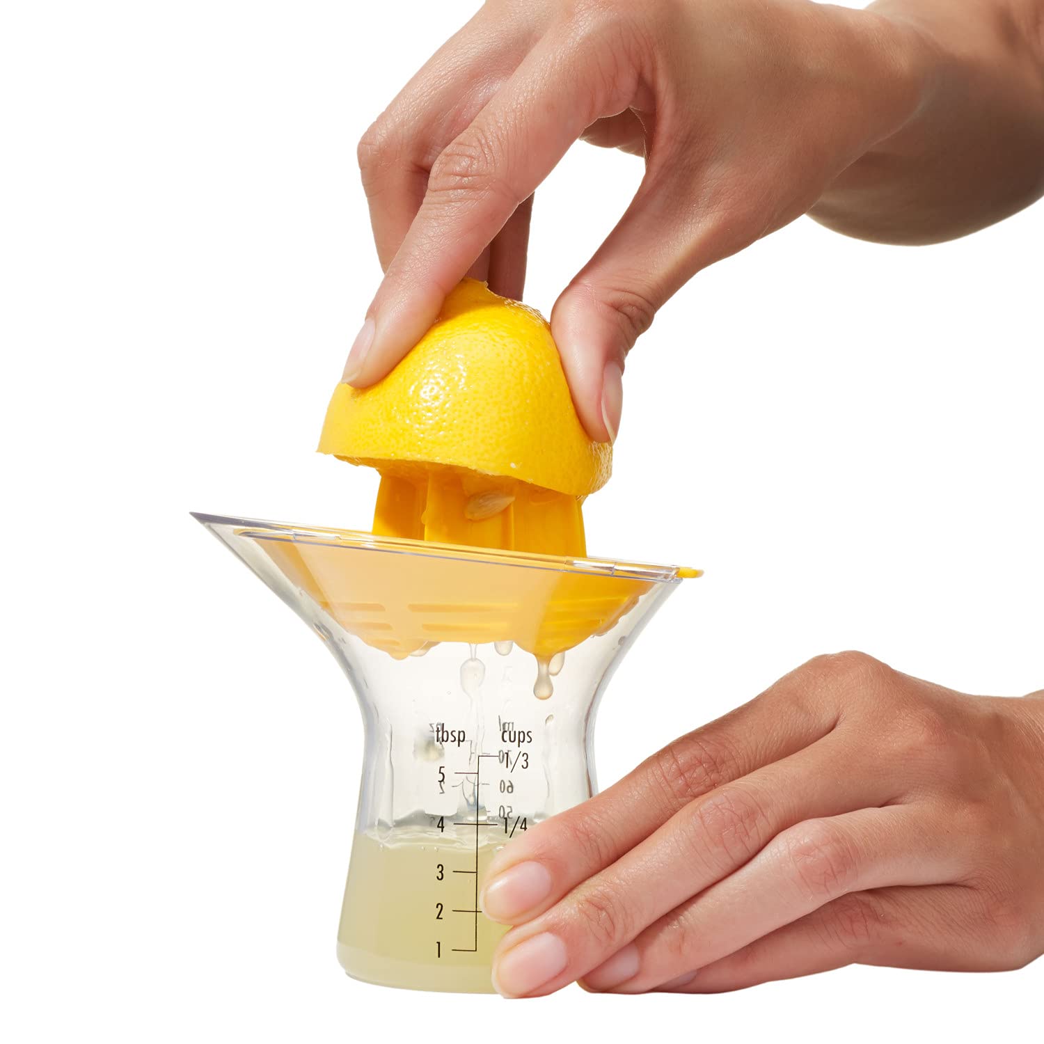 OXO Good Grips small citrus juicer compact kitchen helper for measuring juice.