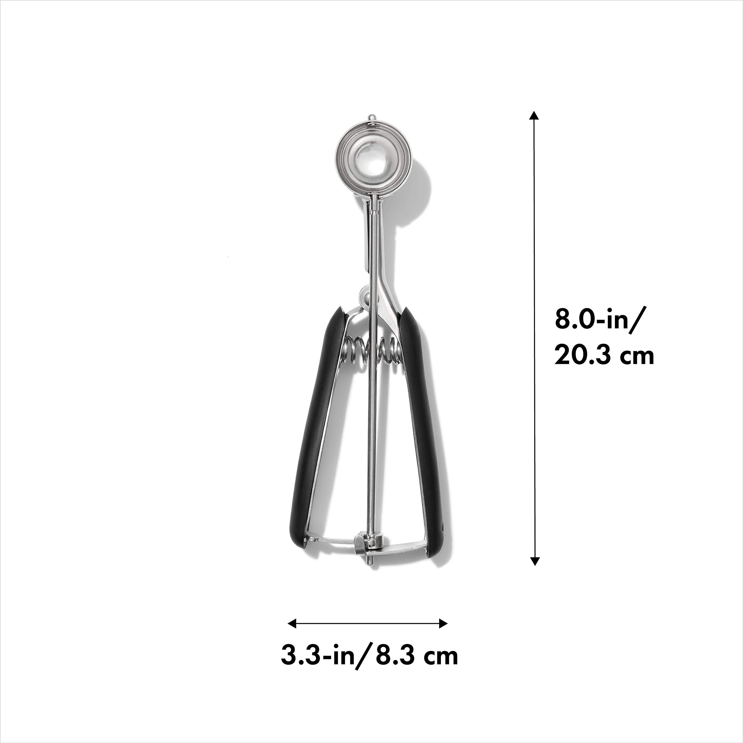 OXO Good Grips cookie scoop dispenses dough smoothly for uniform cookies.