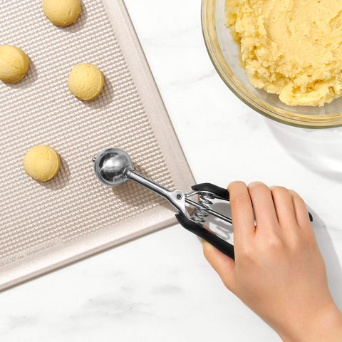 OXO Good Grips 2 tsp portioner supports consistent cookie sizing.