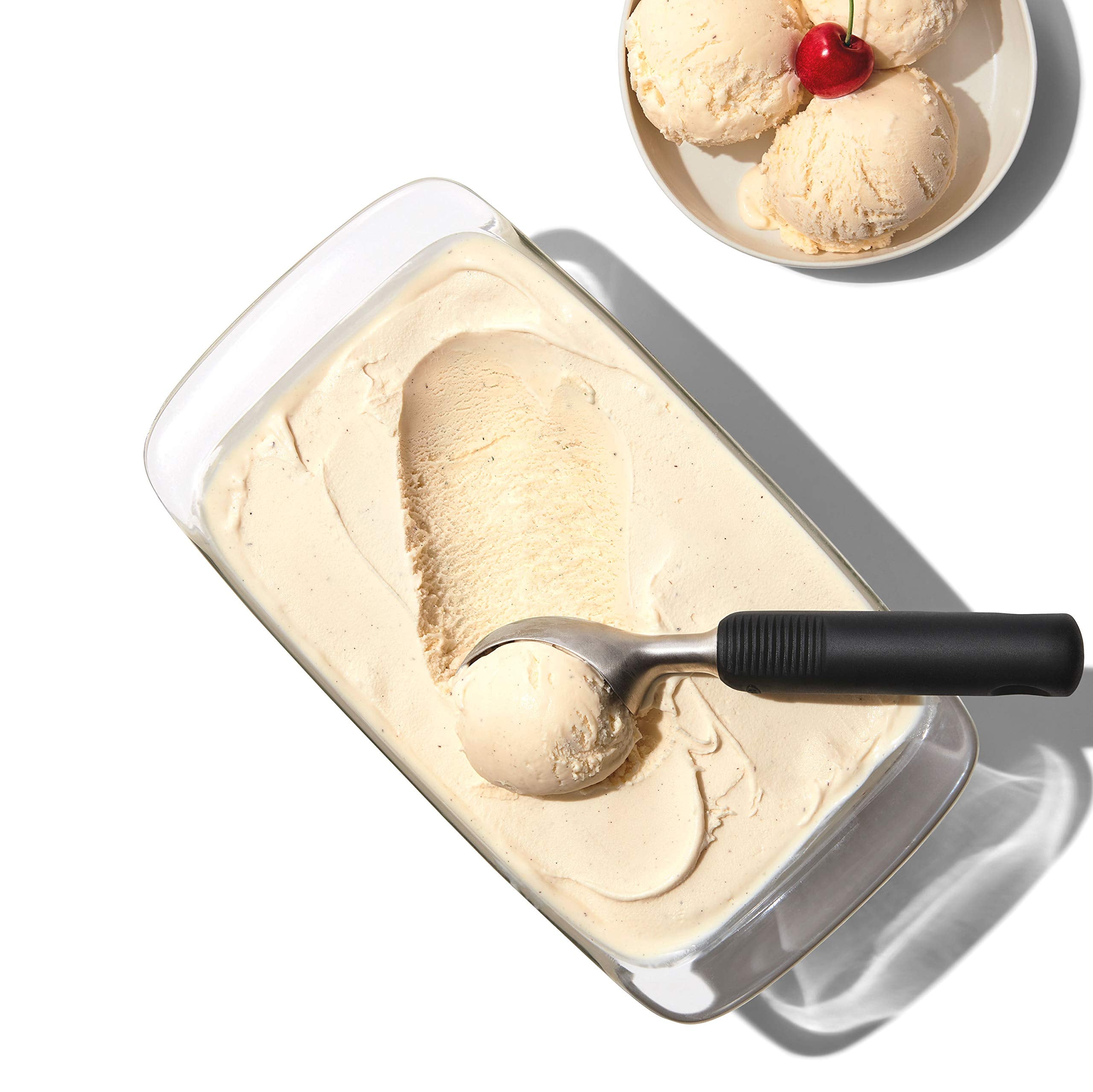 OXO Good Grips scoop curved head close-up, showing effortless scooping.