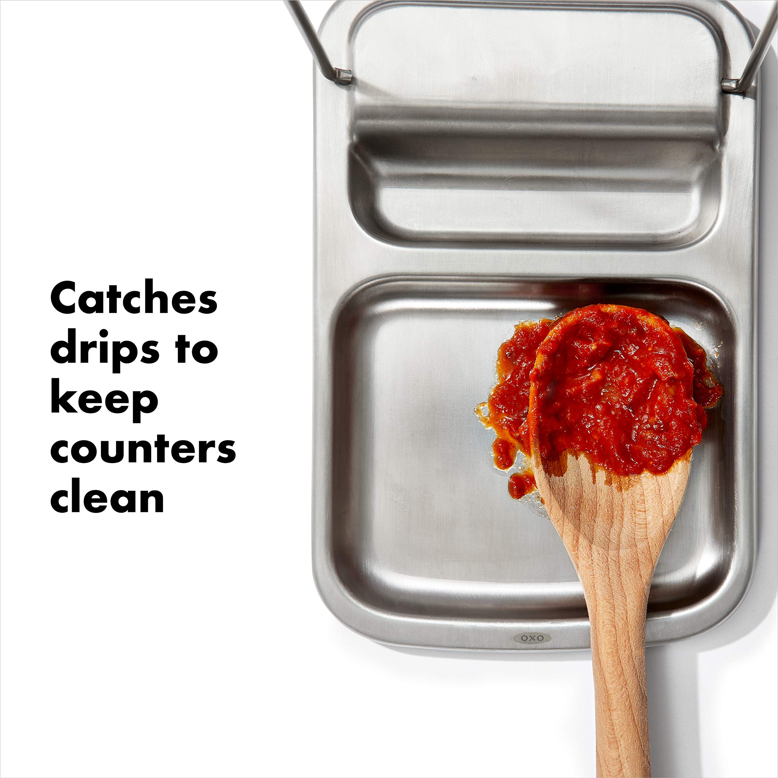 OXO Good Grips Spoon Rest dishwasher safe icon close-up for easy cleaning.