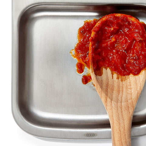 OXO Good Grips Spoon Rest large base capacity holds multiple utensils.