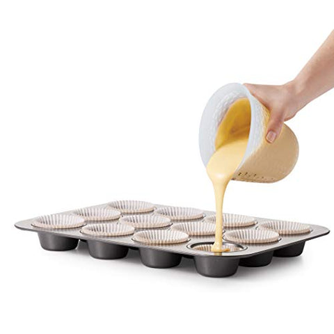 OXO Good Grips squeeze-and-pour cup helps control flow precisely